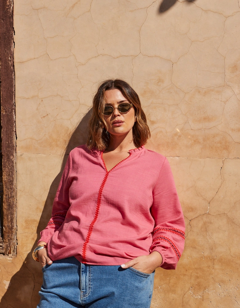 Pink Blouse With Red Trim Detail