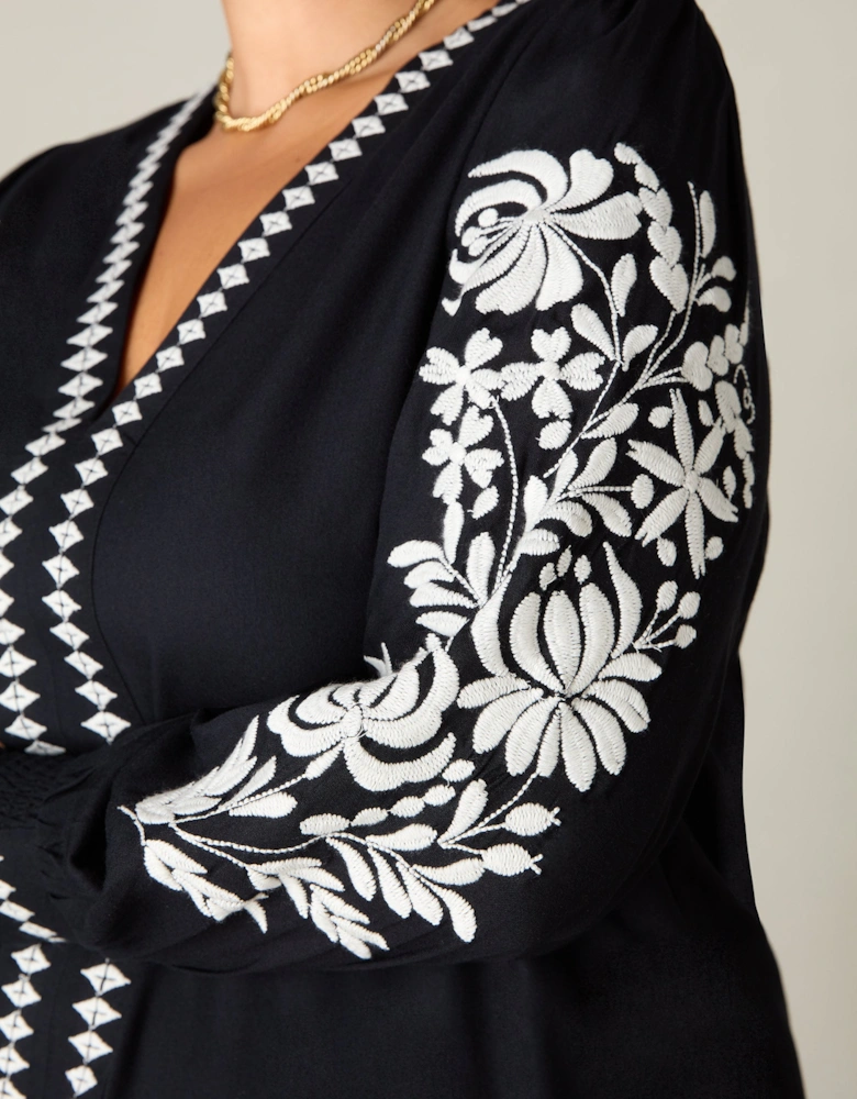 Black Embroidered Swing Dress