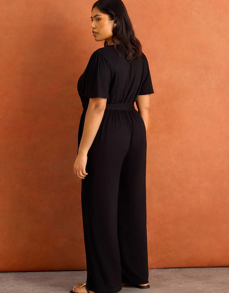 Black V Neck Wrap Flutter Sleeve Jersey Jumpsuit