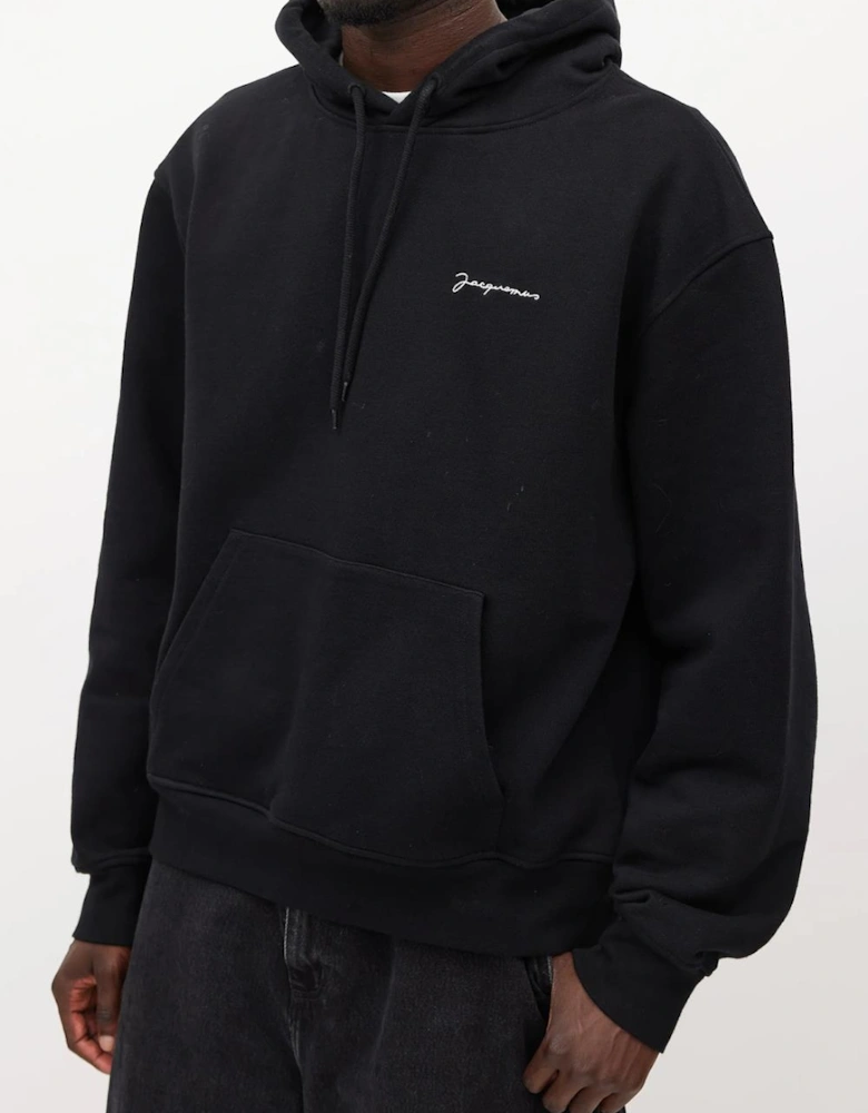 Jacquemus Signature Embroidered Logo Hoodie in Black