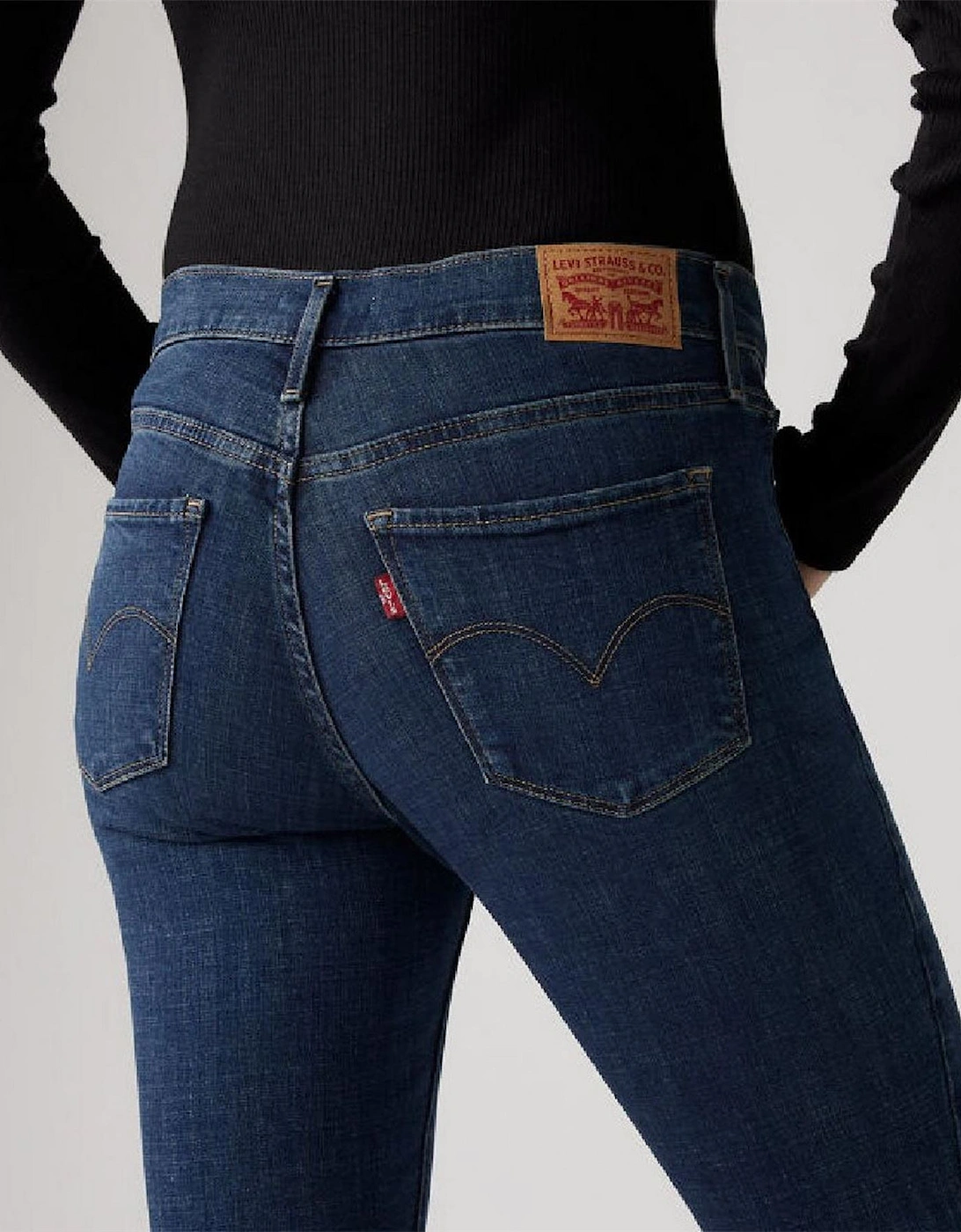 311 Skinny Mid Rise Jeans