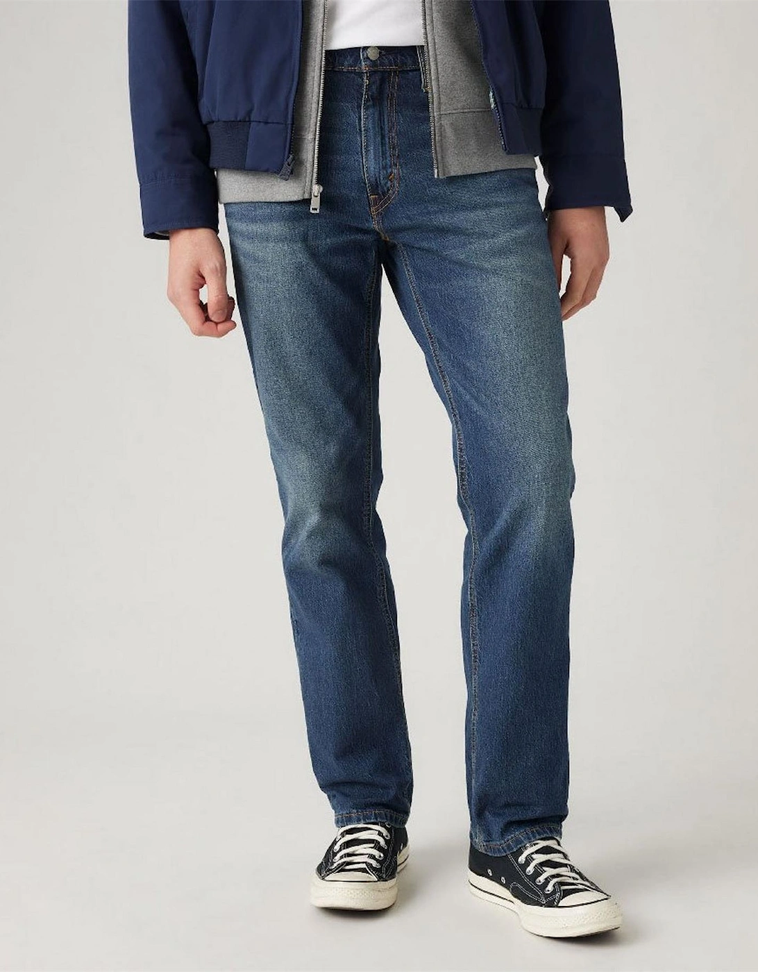 Mid Rise Tapered Fit Five Pocket Jeans