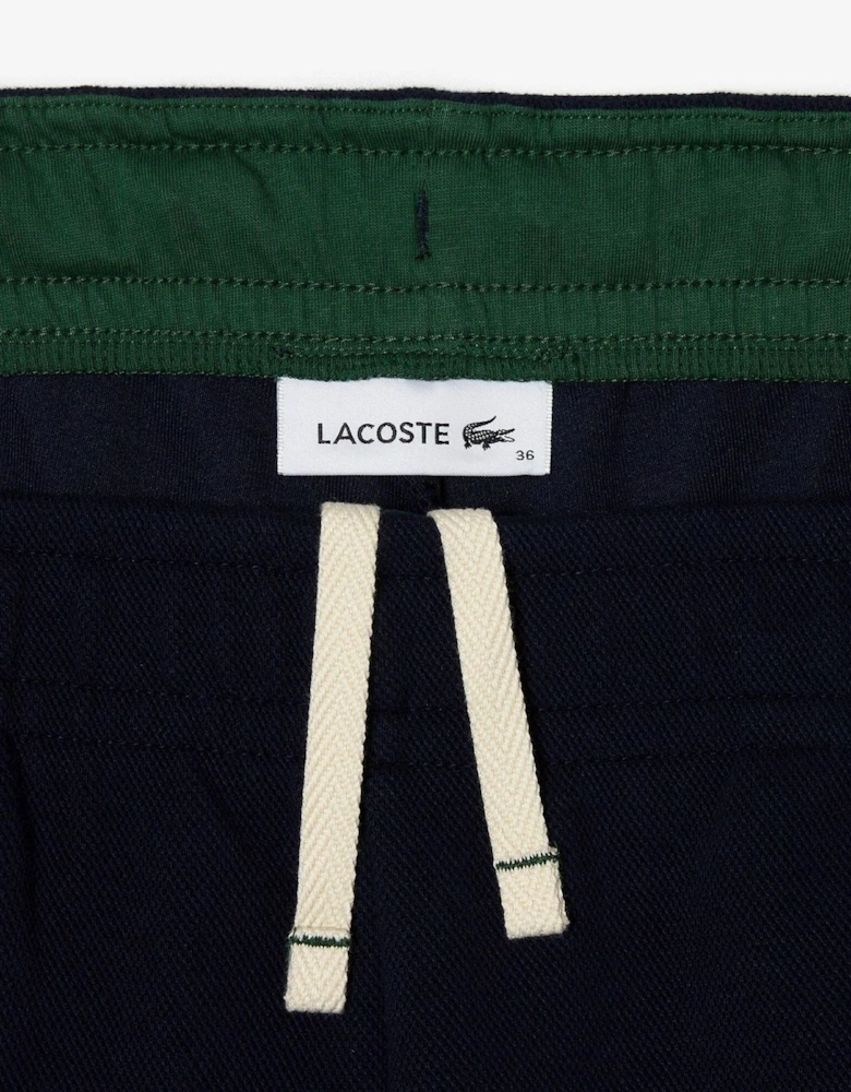 Solid Patterned Elasticated Cuff Slim Joggers