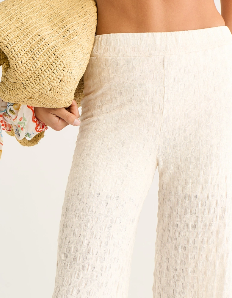 Beige Textured Elasticated Waist Flared Trousers