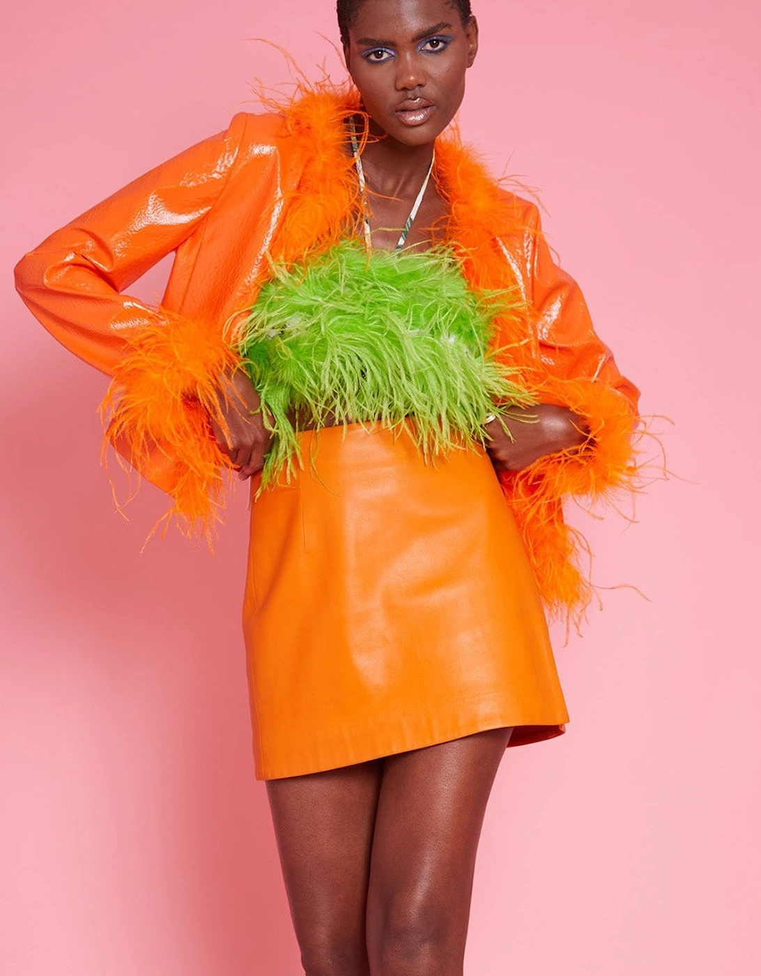 Faux Leather Jacket with Feather Trim