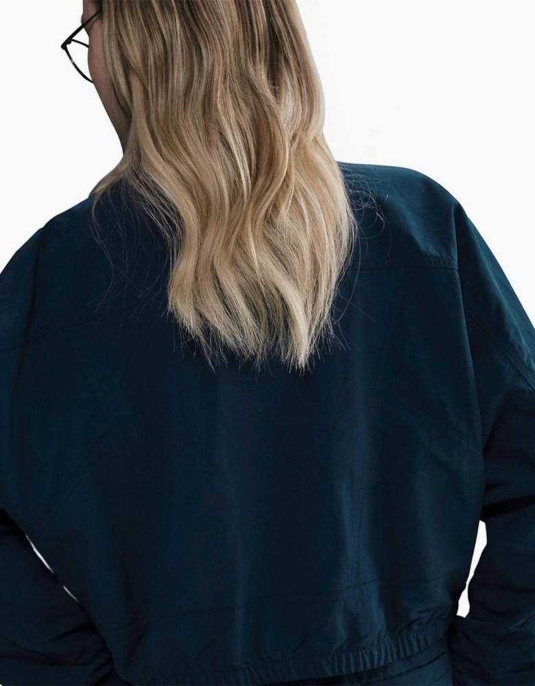 Solid Patterned Zipped Pocket Windbreaker Jacket