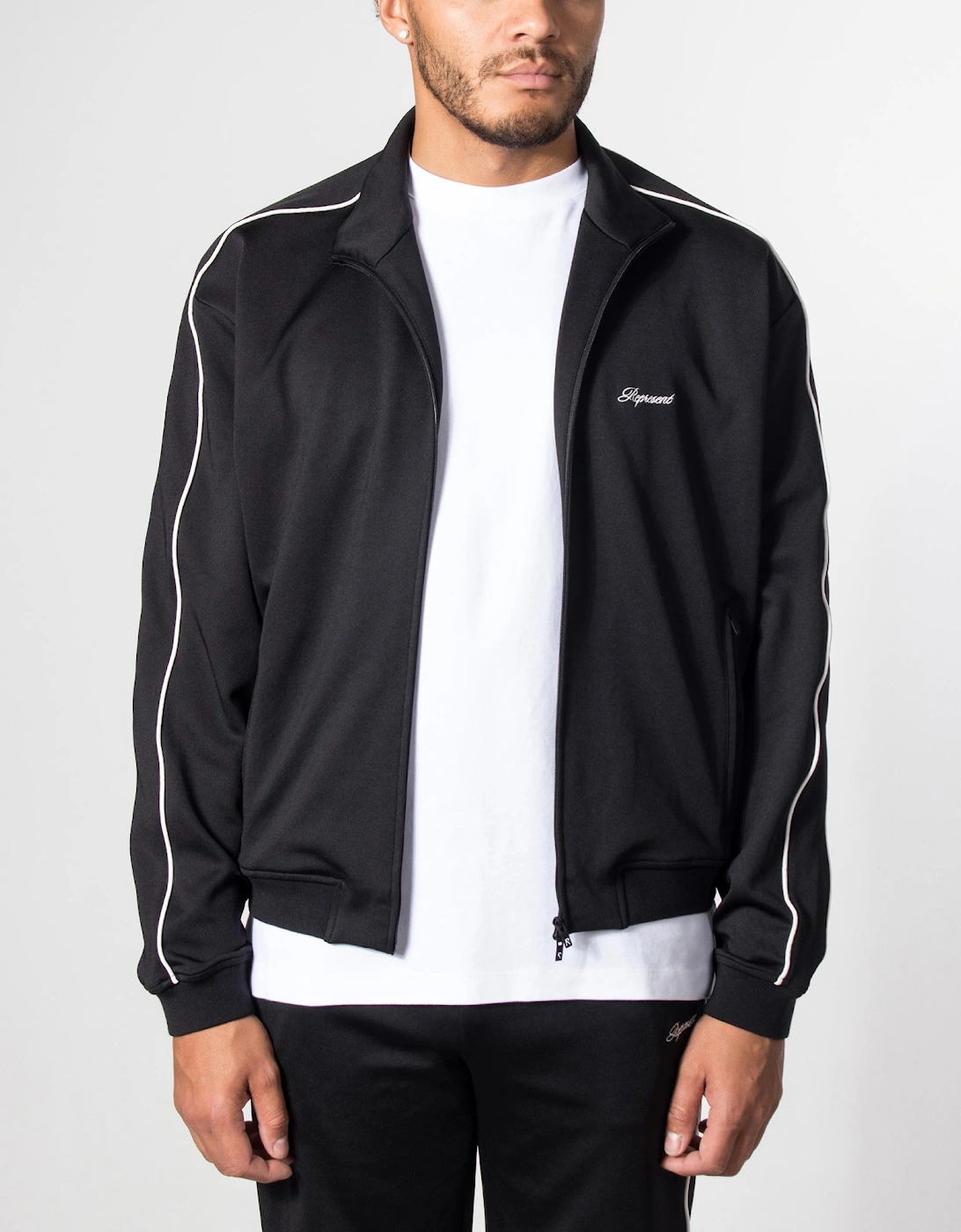 Taped Track Top