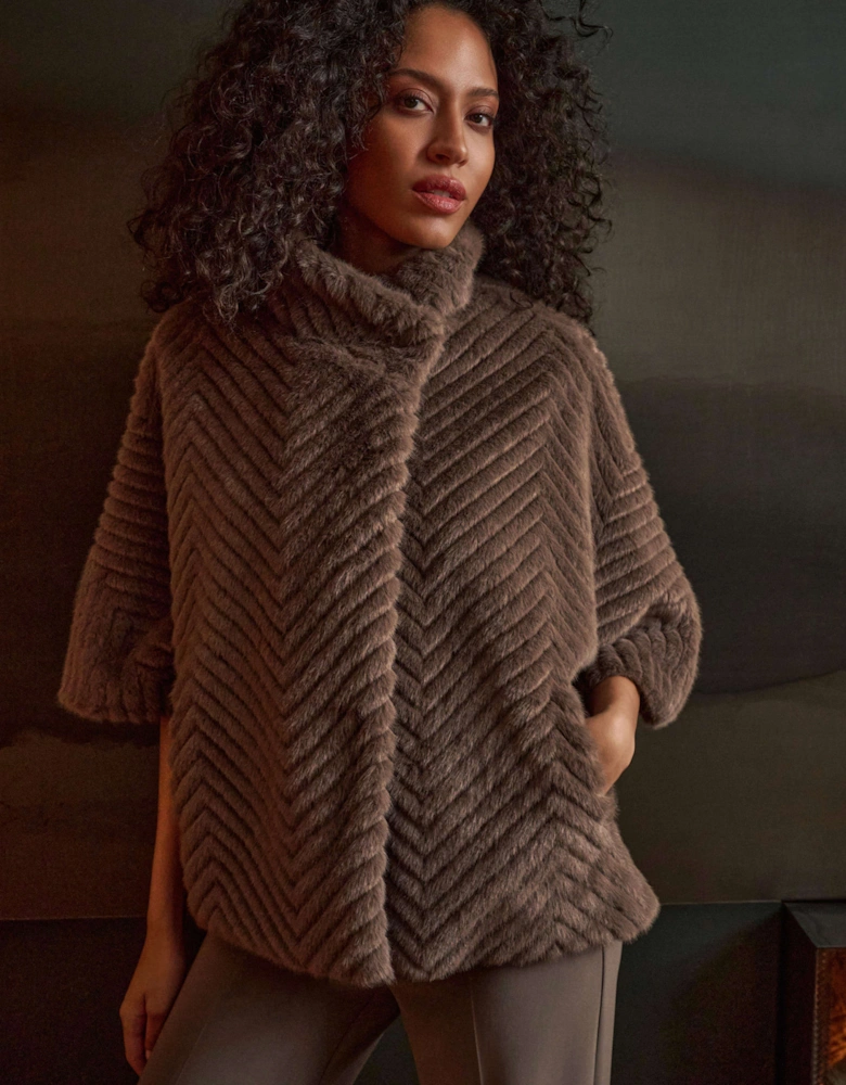 Chevron faux fur cape style jacket