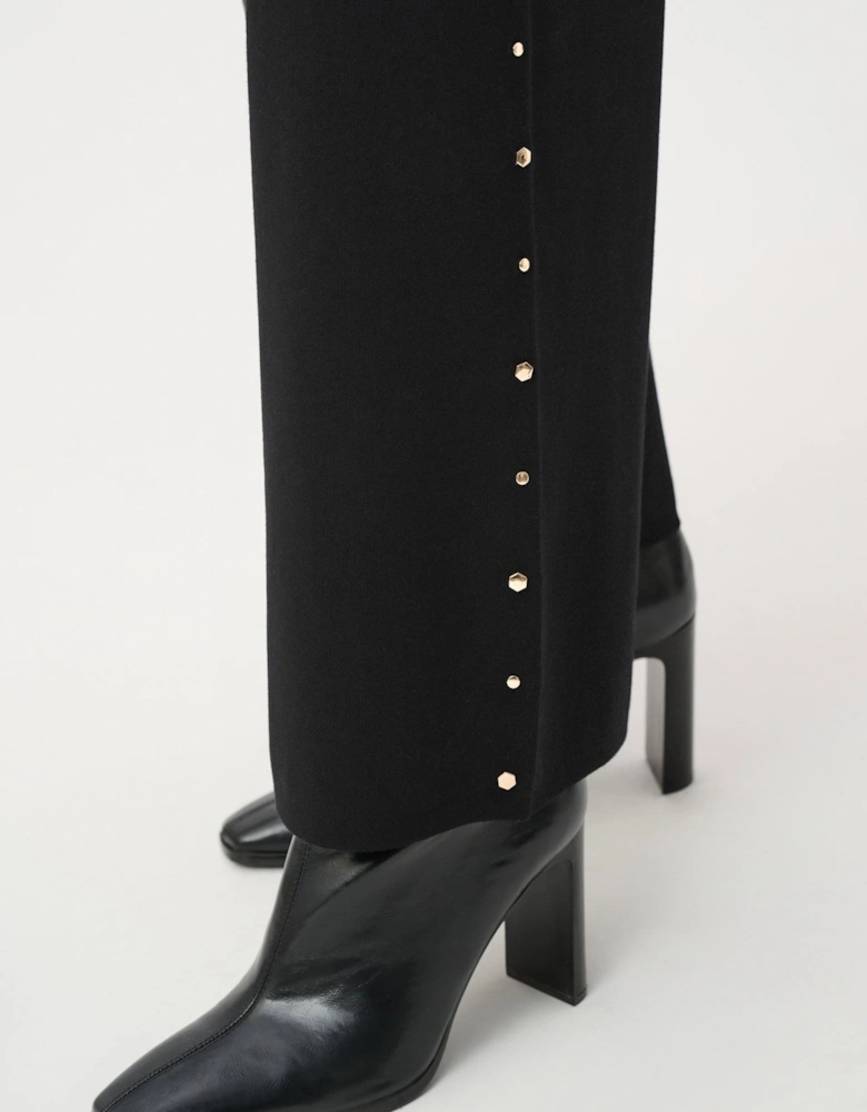 Wide leg pull on sweater pants with metal stud detail