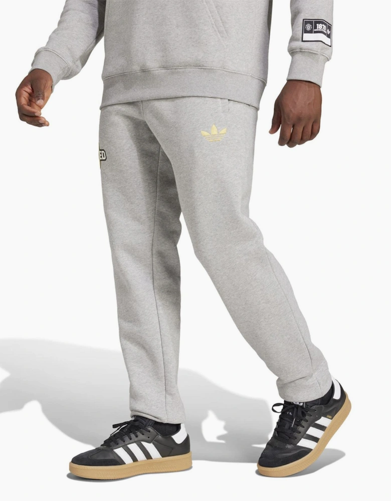 Mu Solid Patterned Slim Track Pants