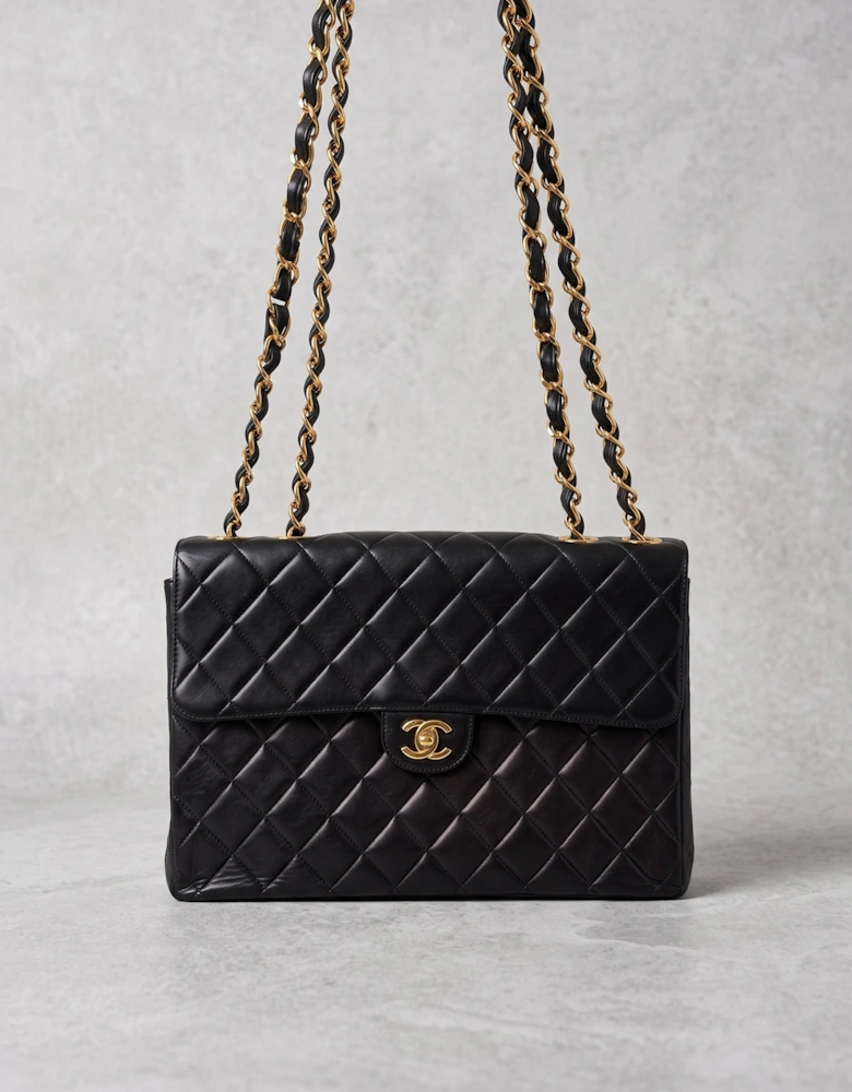 Vintage Chanel Classic Double Flap in black lambskin with gold hardware