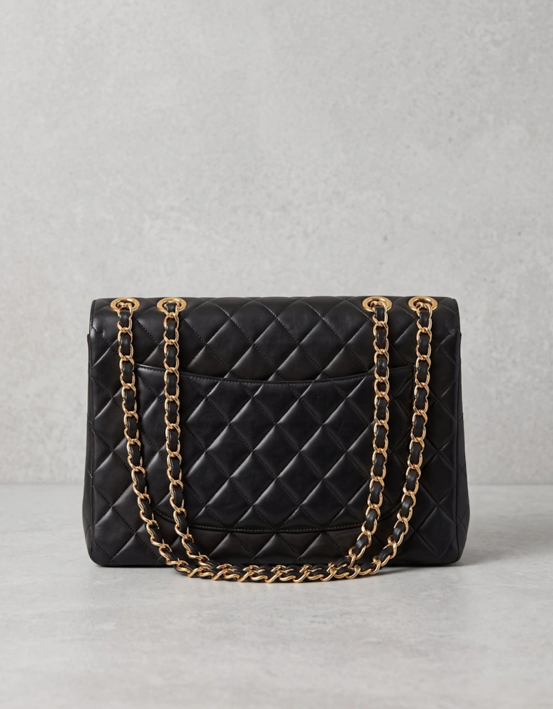 Vintage Chanel Classic Double Flap in black lambskin with gold hardware