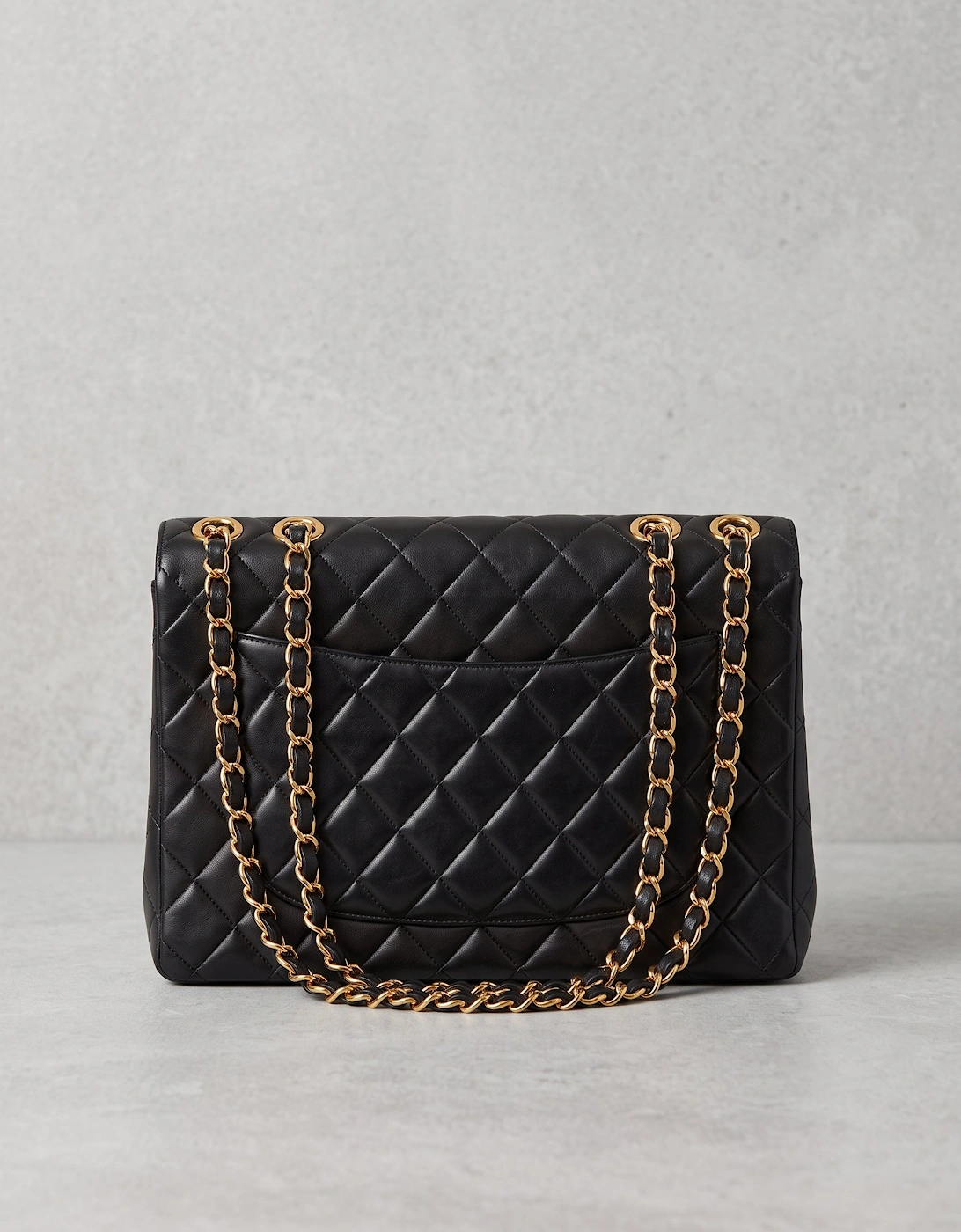 Vintage Chanel Classic Double Flap in black lambskin with gold hardware