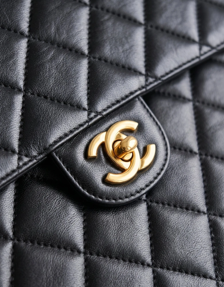 Vintage Chanel Classic Double Flap in black lambskin with gold hardware