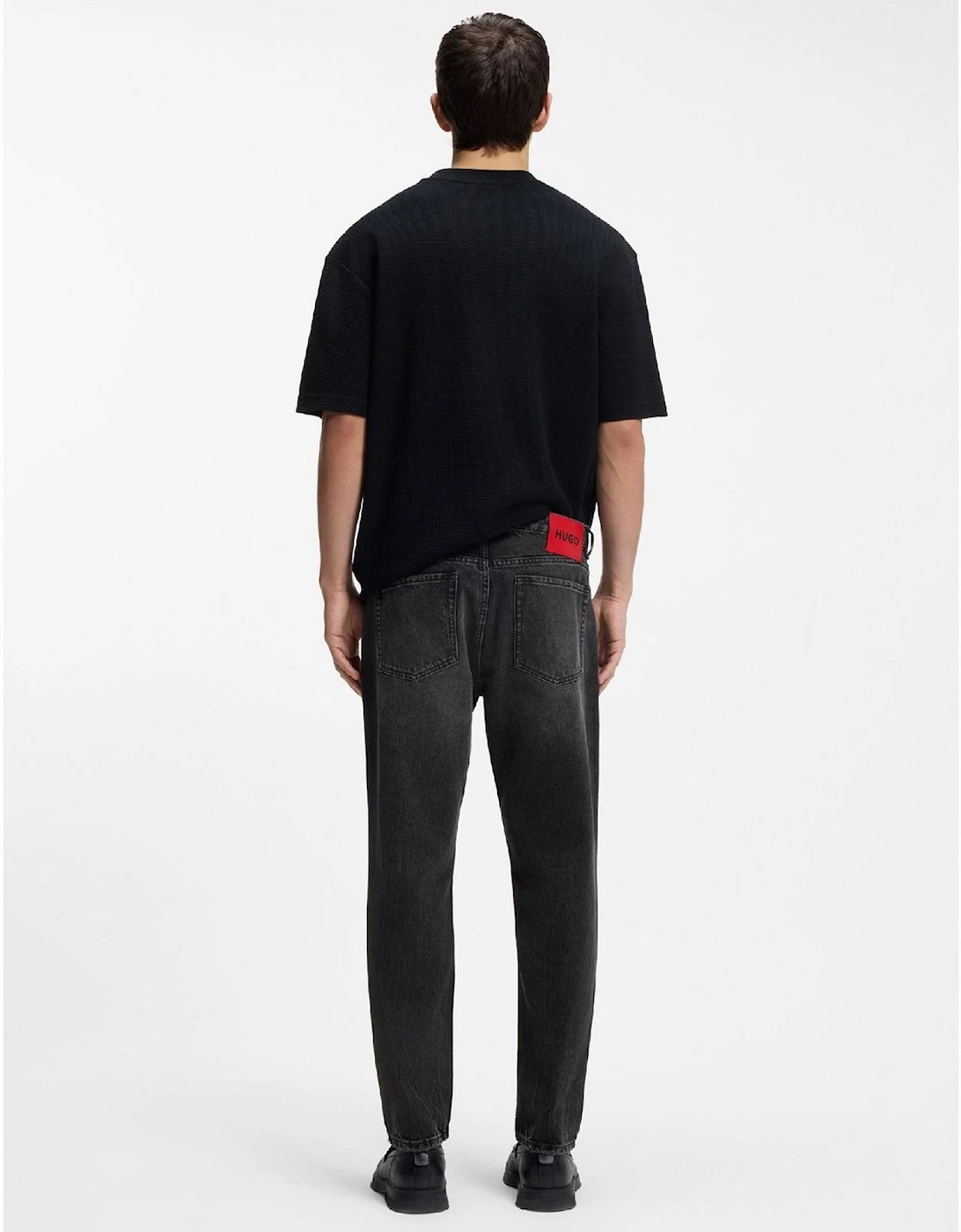 Distressed Tapered Fit Jeans