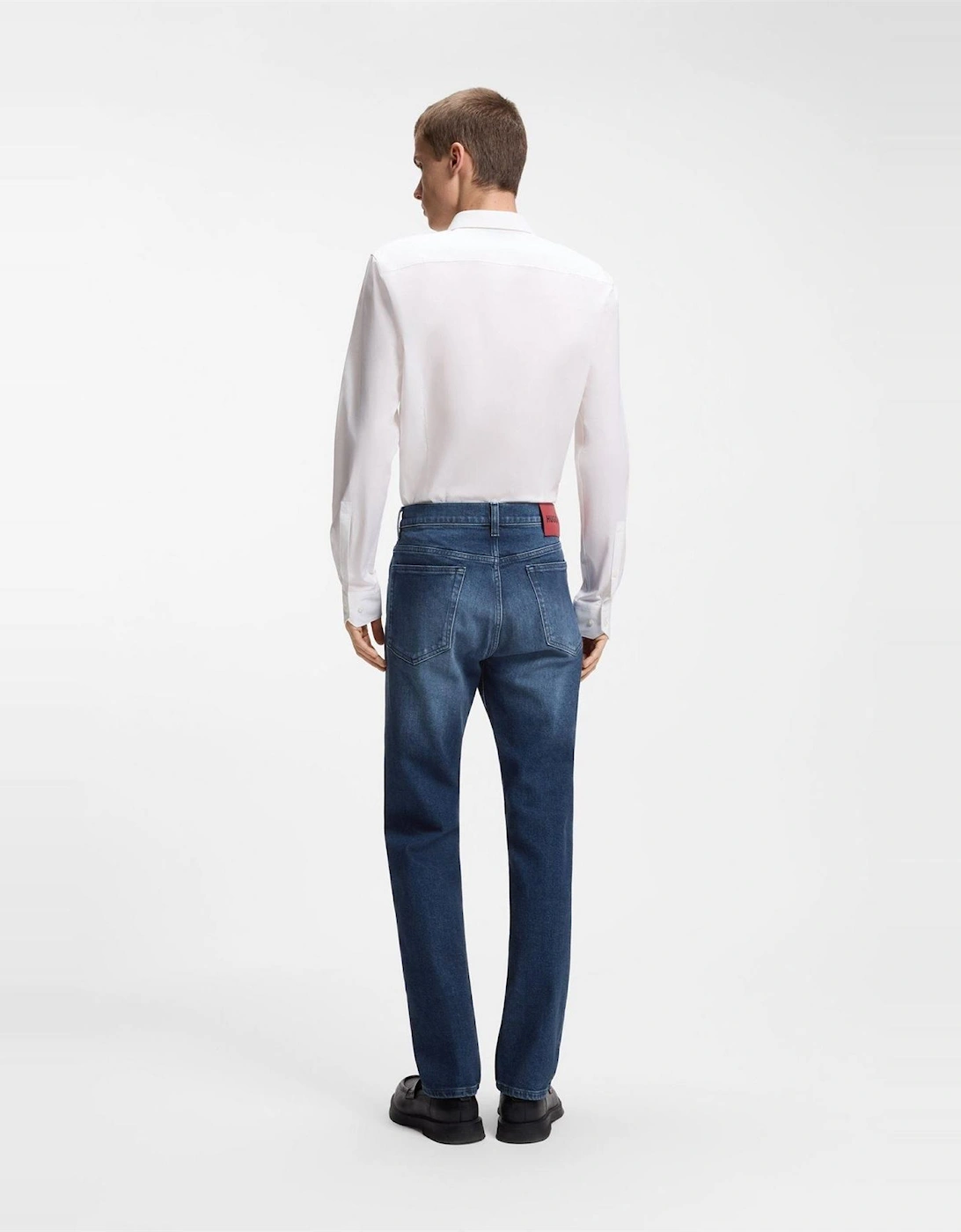 Mid Rise Slim Fit Five Pocket Jeans