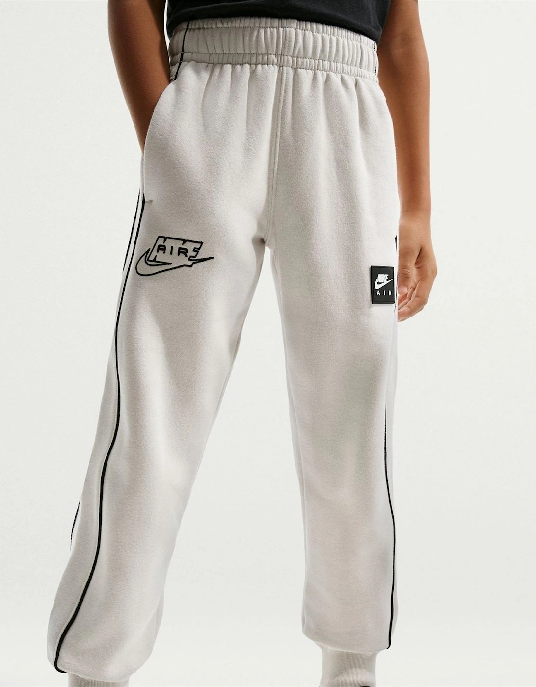 Nike Nike Logo Print Slim Joggers with Side Stripes - White