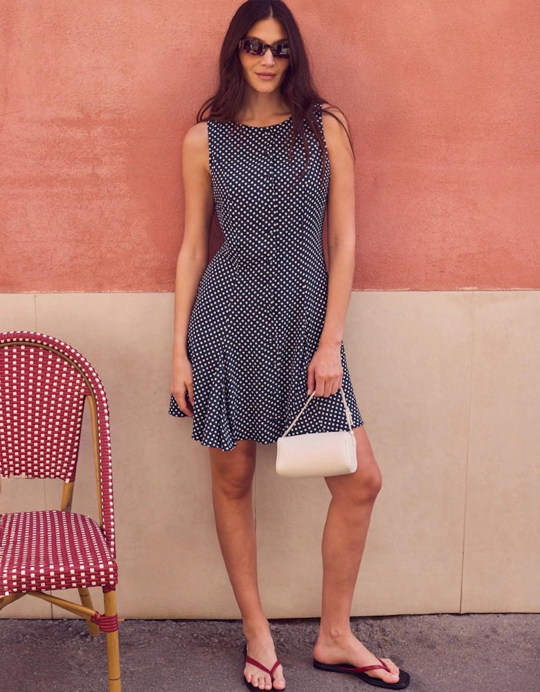 Navy Polka Dot Godet Mini Dress