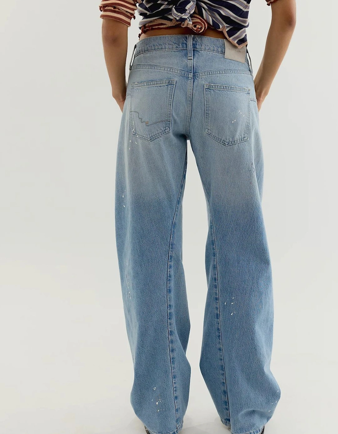 The Free Fable Low-Rise Twisted Bowed Jeans