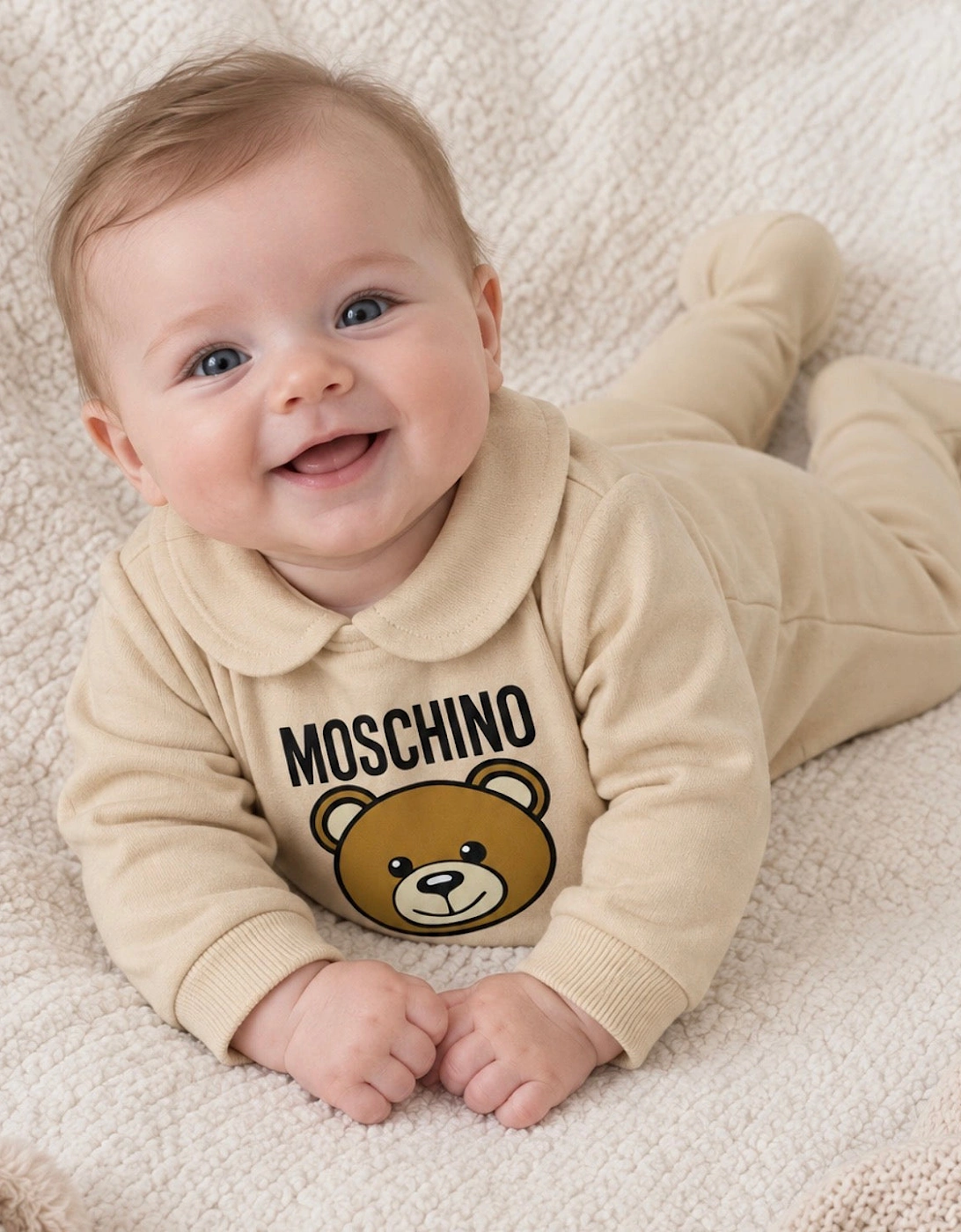 MOSCHINO NEW BORN BEIGE BABYGROW MUY098