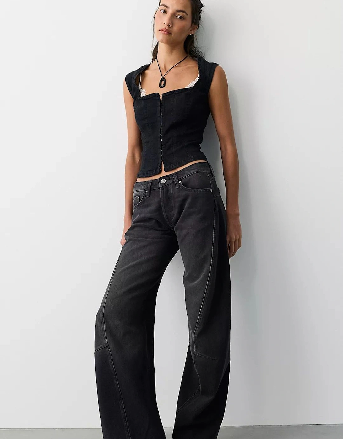 The Free Fable Low-Rise Twisted Bowed Jeans