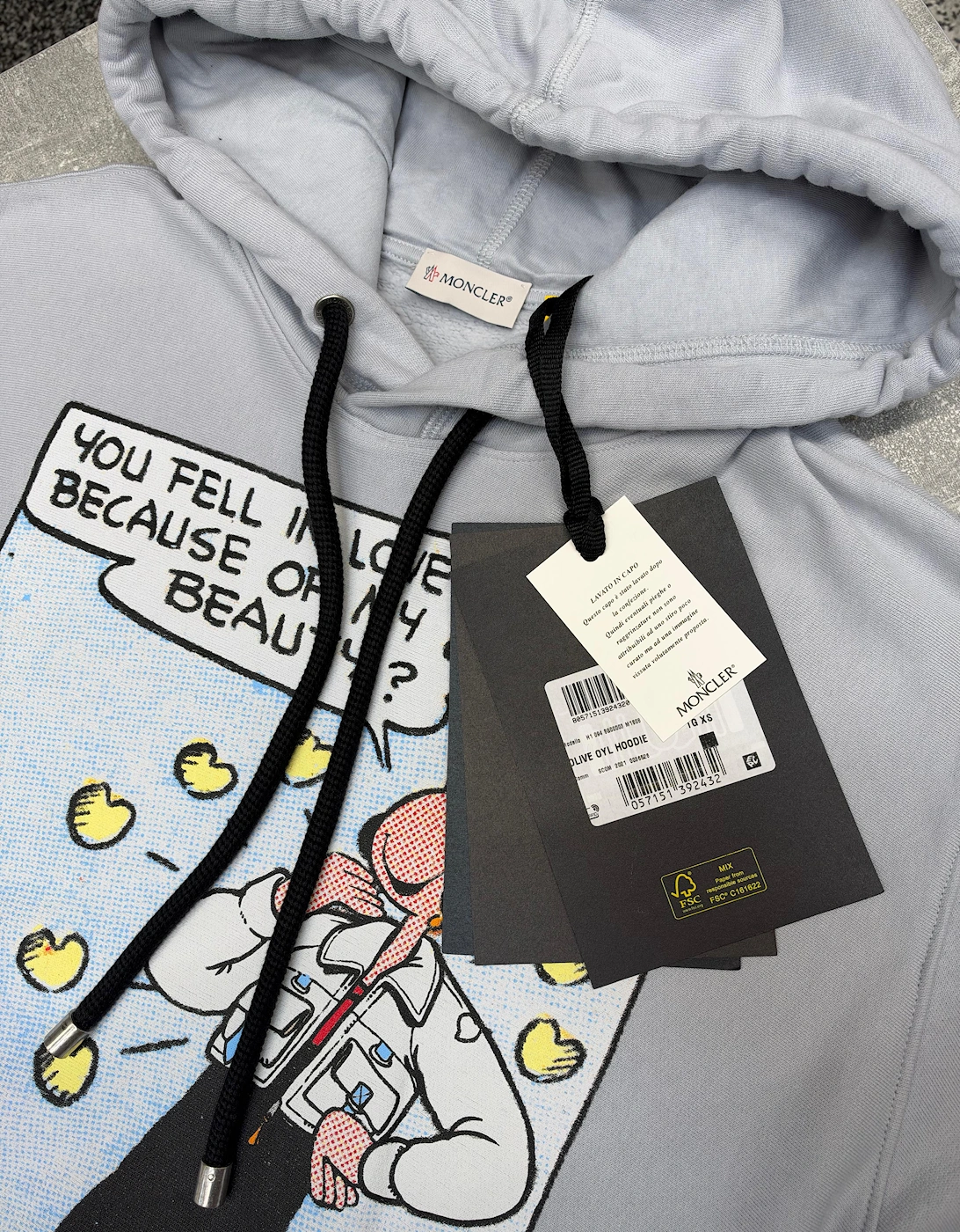 MONCLER GENIUS X OLIVE OYL OVERSIZED GRAPHIC HOODIE PALE BLUE
