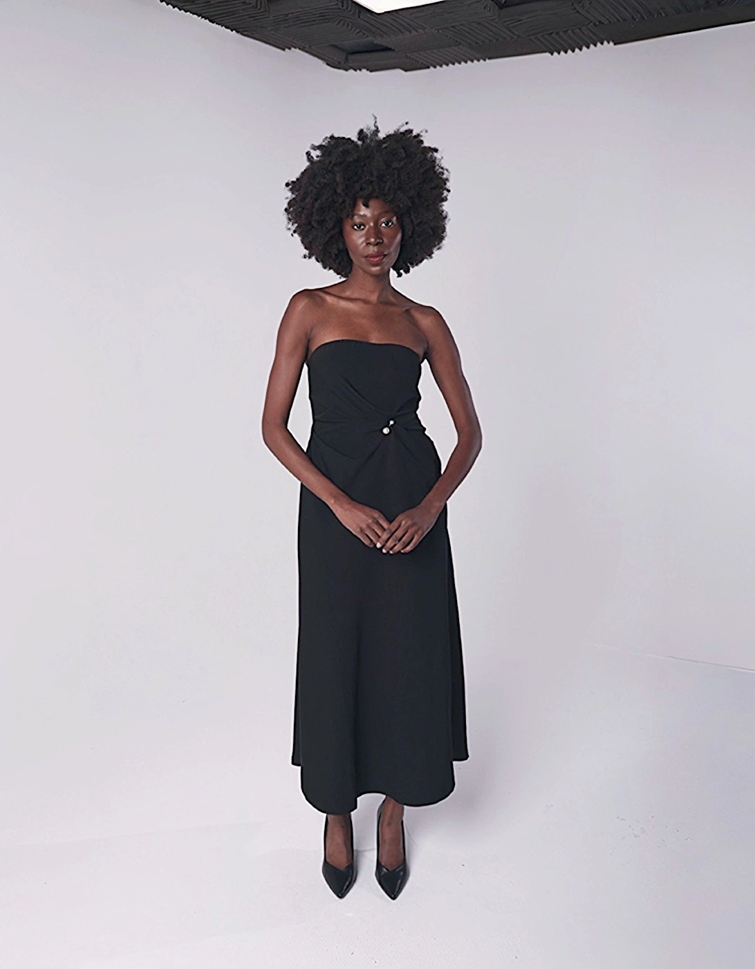 Black Strapless Dress With Asymmetrical Folds And Pearl Detail