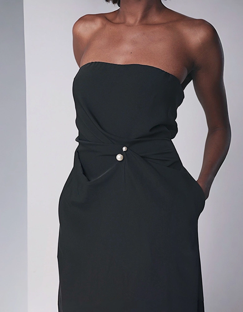 Black Strapless Dress With Asymmetrical Folds And Pearl Detail
