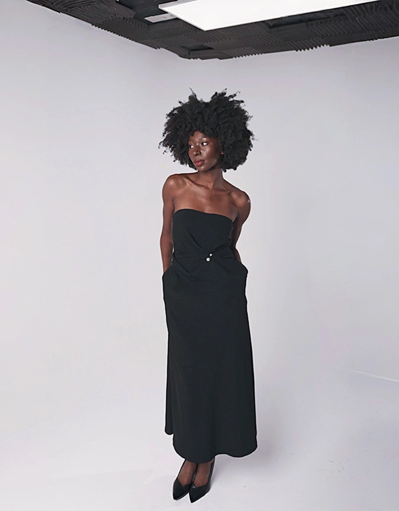 Black Strapless Dress With Asymmetrical Folds And Pearl Detail