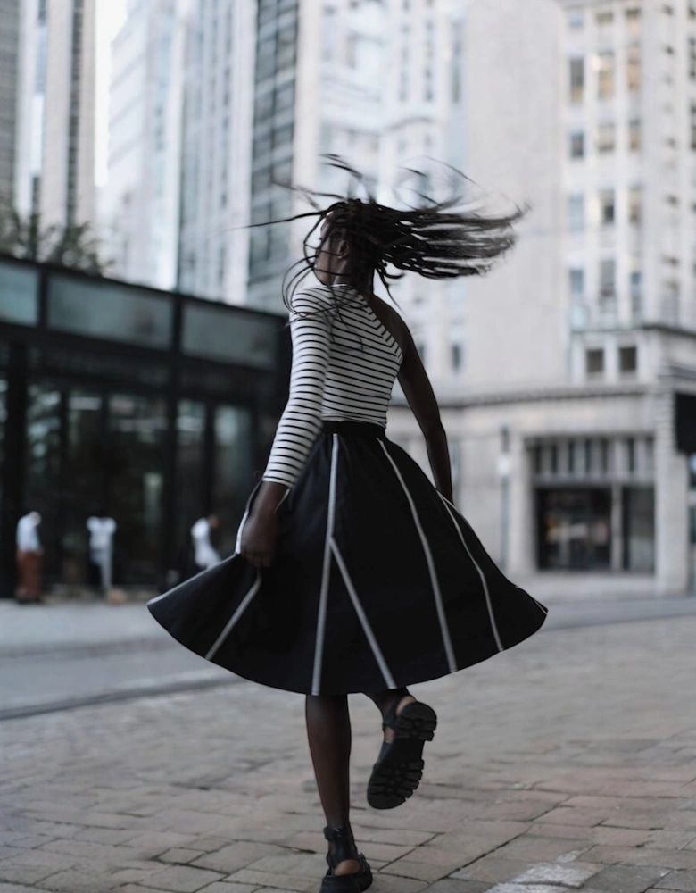 Black Skirt With Panels And White Contrast Tape