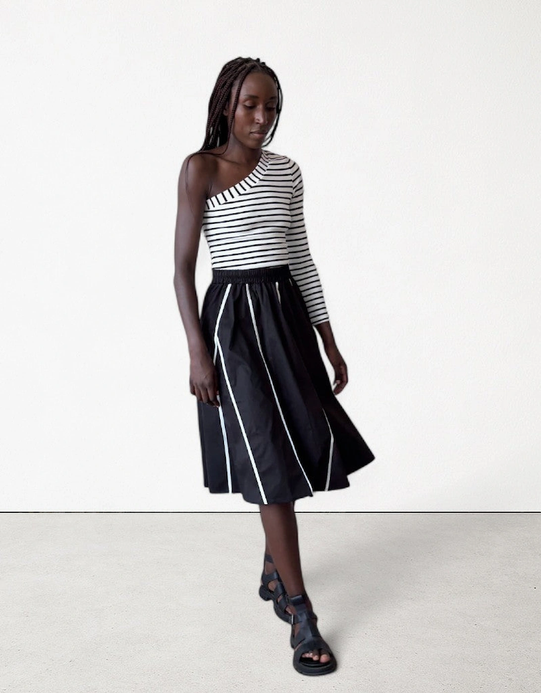 Black Skirt With Panels And White Contrast Tape