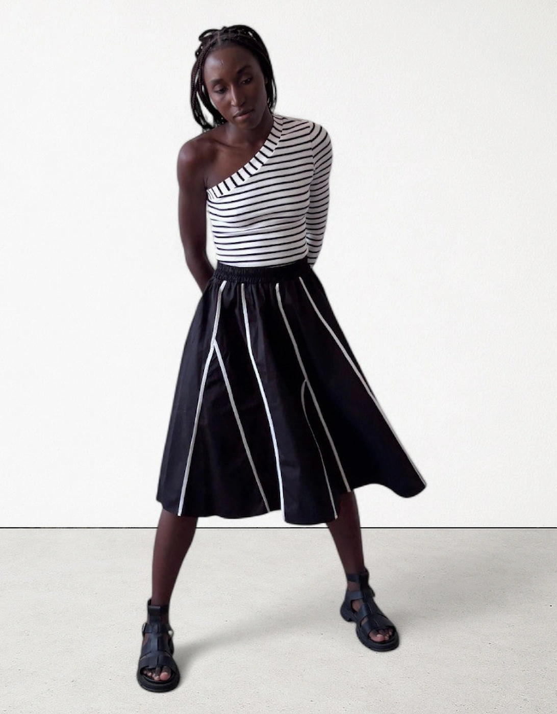 Black Skirt With Panels And White Contrast Tape