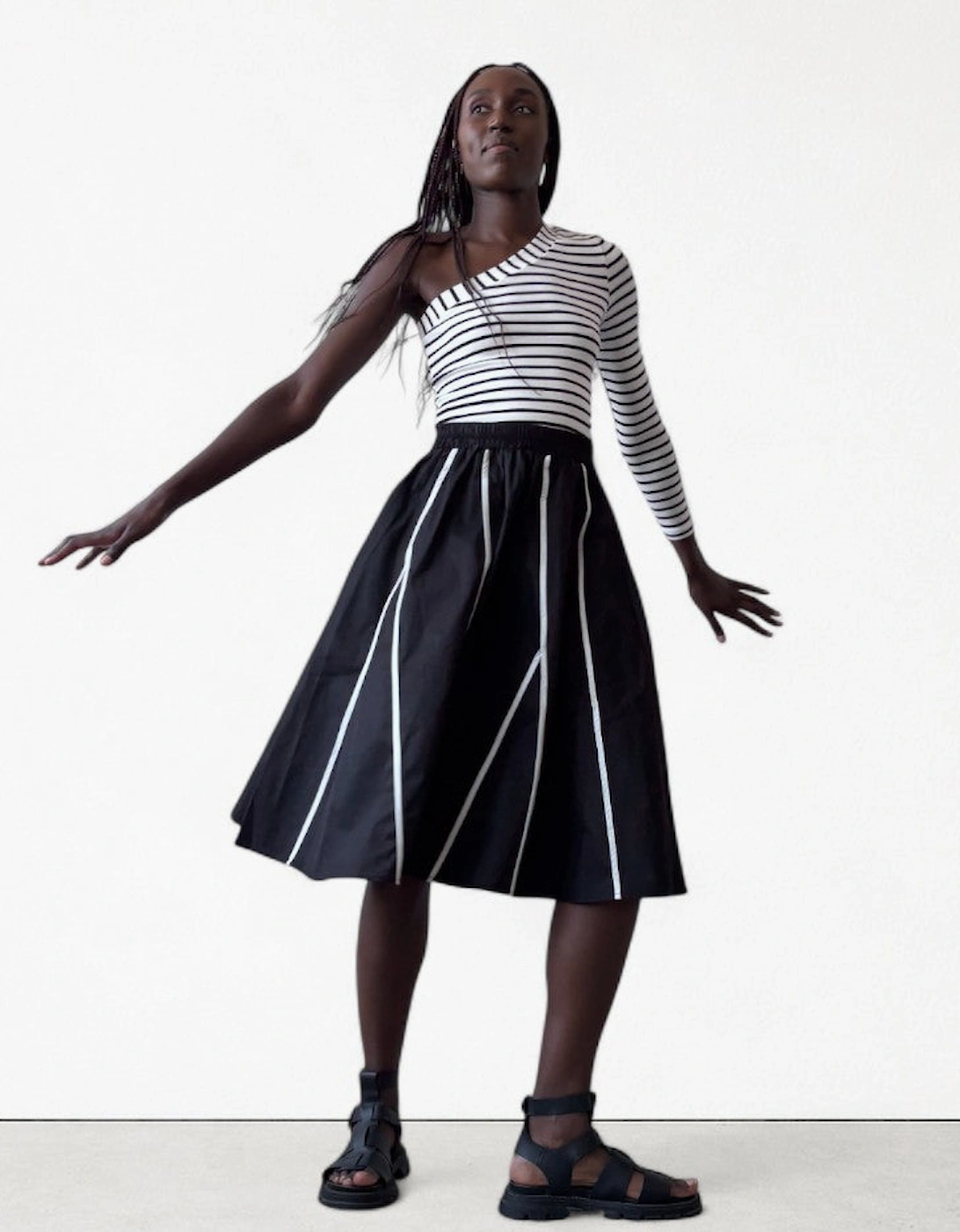 Black Skirt With Panels And White Contrast Tape