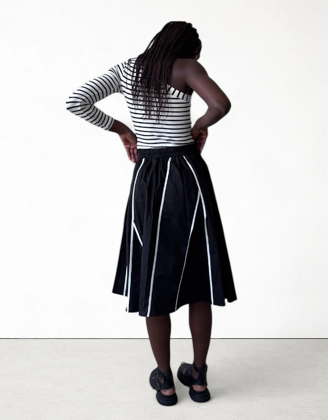 Black Skirt With Panels And White Contrast Tape